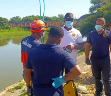 Defensa Civil recupera cadáver en compuerta de La Otra Banda del río Yaque del Norte