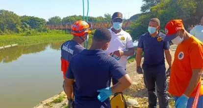 Defensa Civil recupera cadáver en compuerta de La Otra Banda del río Yaque del Norte